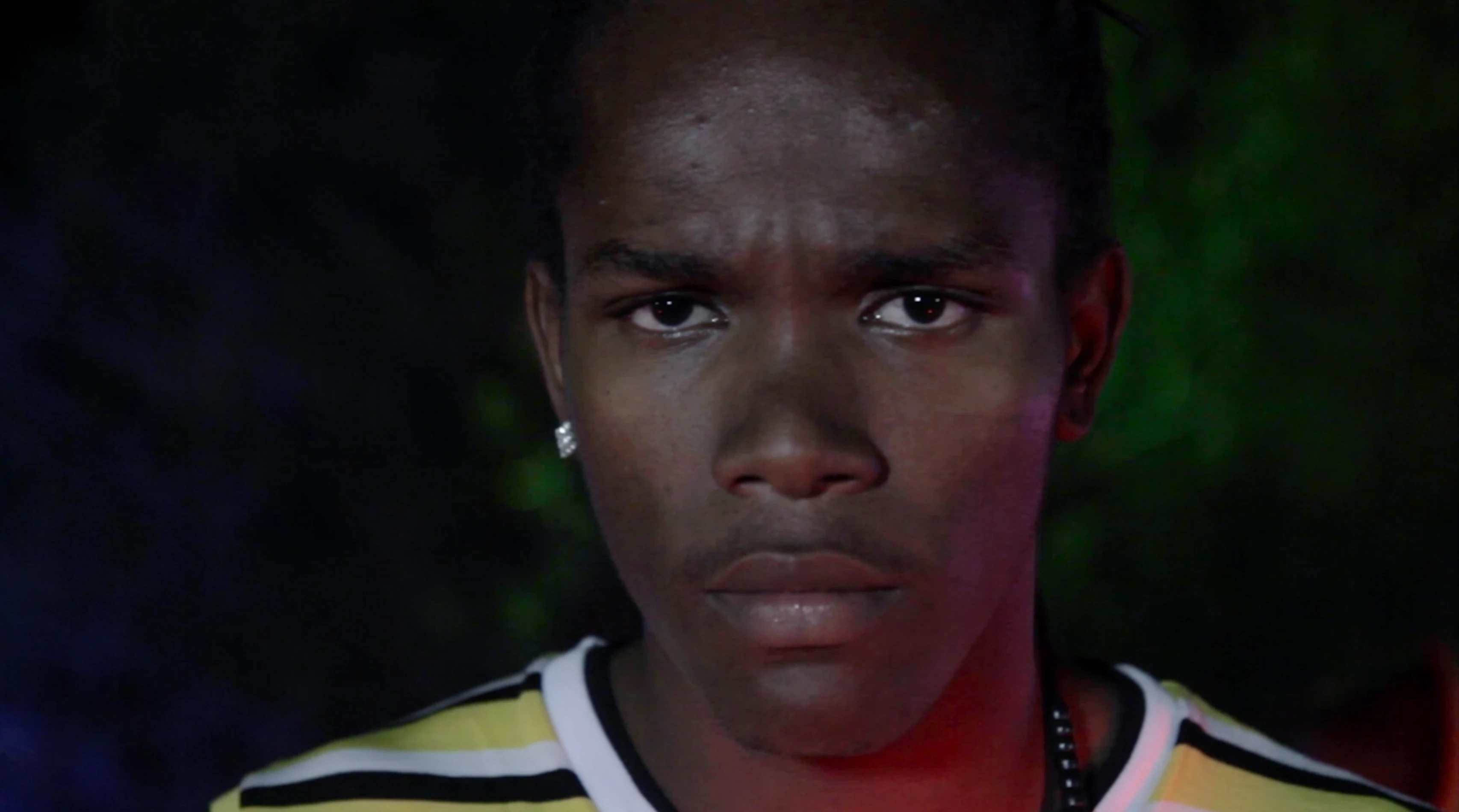 TV spot still: close-up of young man's face